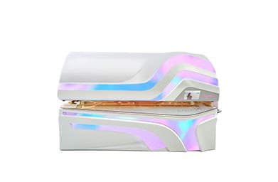 White Ergoline Elements tanning bed with colorful highlights, modern design, perfect for relaxing and effective tanning.